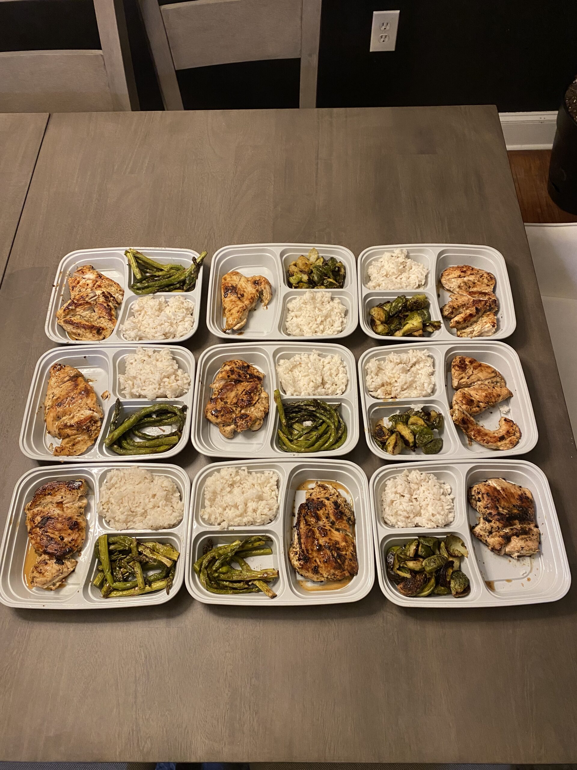 3 compartment meal prep containers with chicken green beans and rice